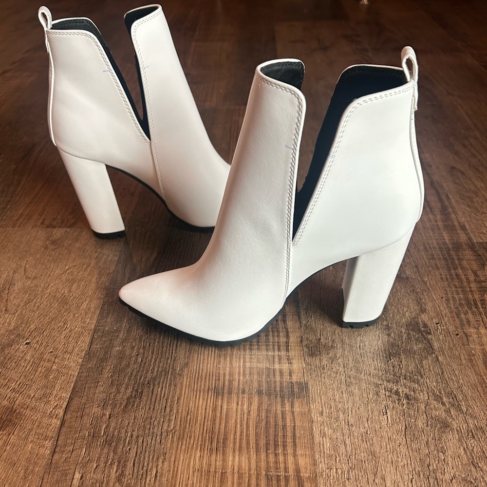 White heeled booties.